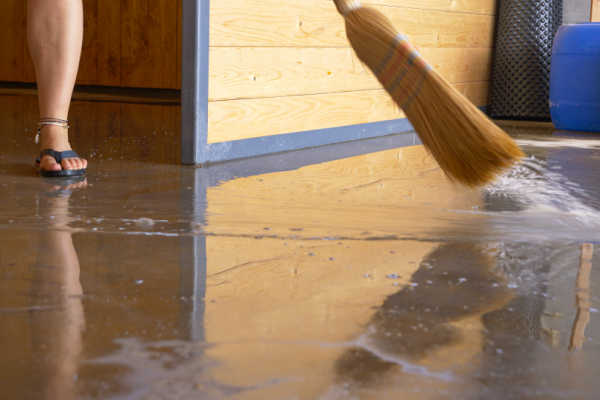 Sweeping water from a flooded basement